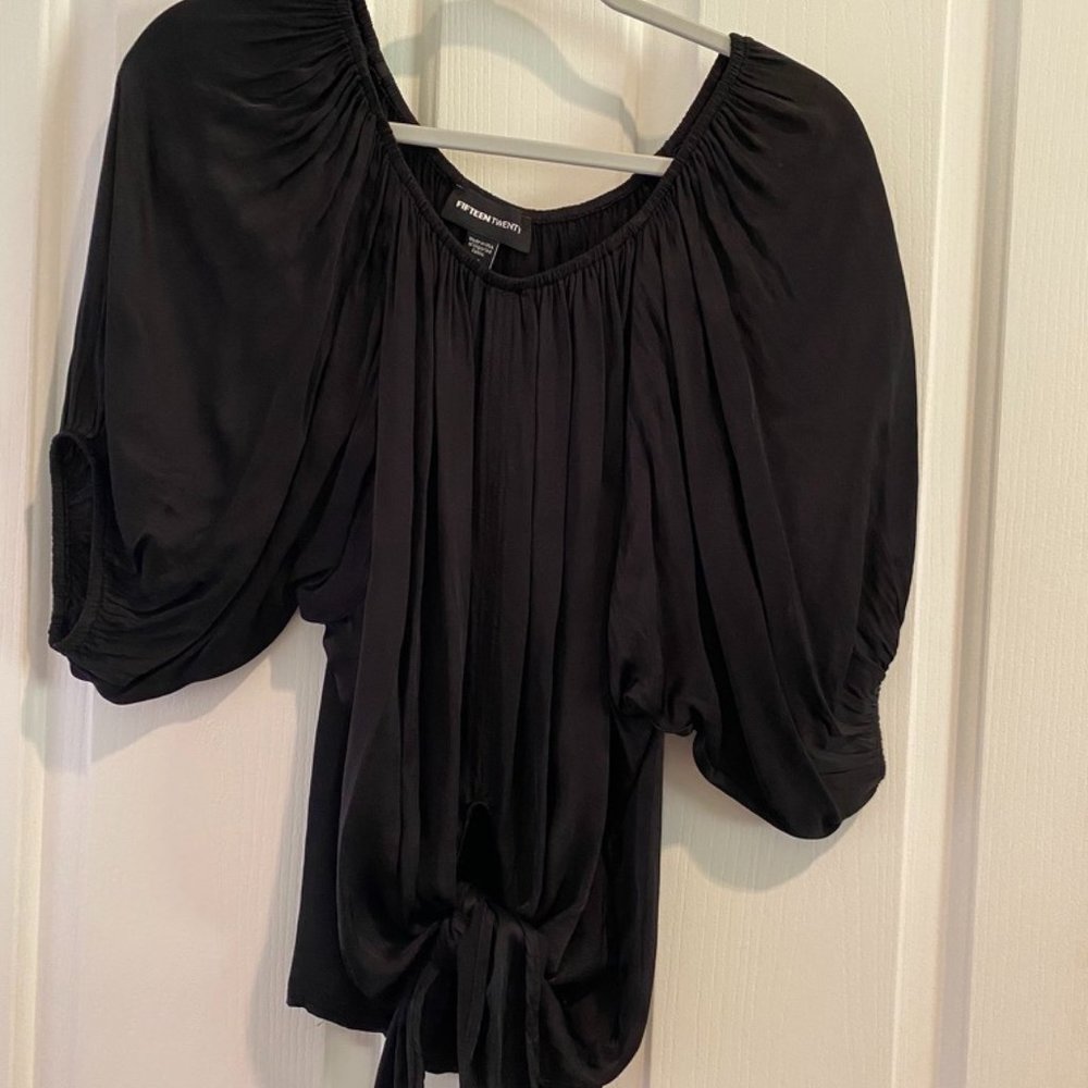 Beautiful black blouse with 3/4 sleeve and tie in front!